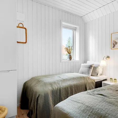 Three-bedroom In Hébergement de vacances